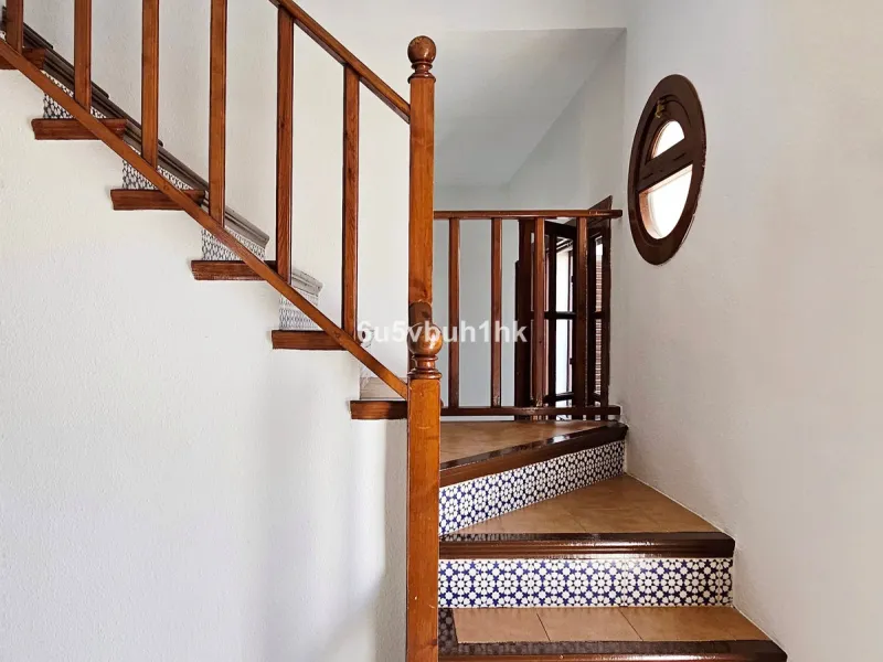 Located in the established Bahia Azul urbanisation, this traditional Spanish house offers an excellent opportunity to acquire a property with direct access to the beach and communal amenities.