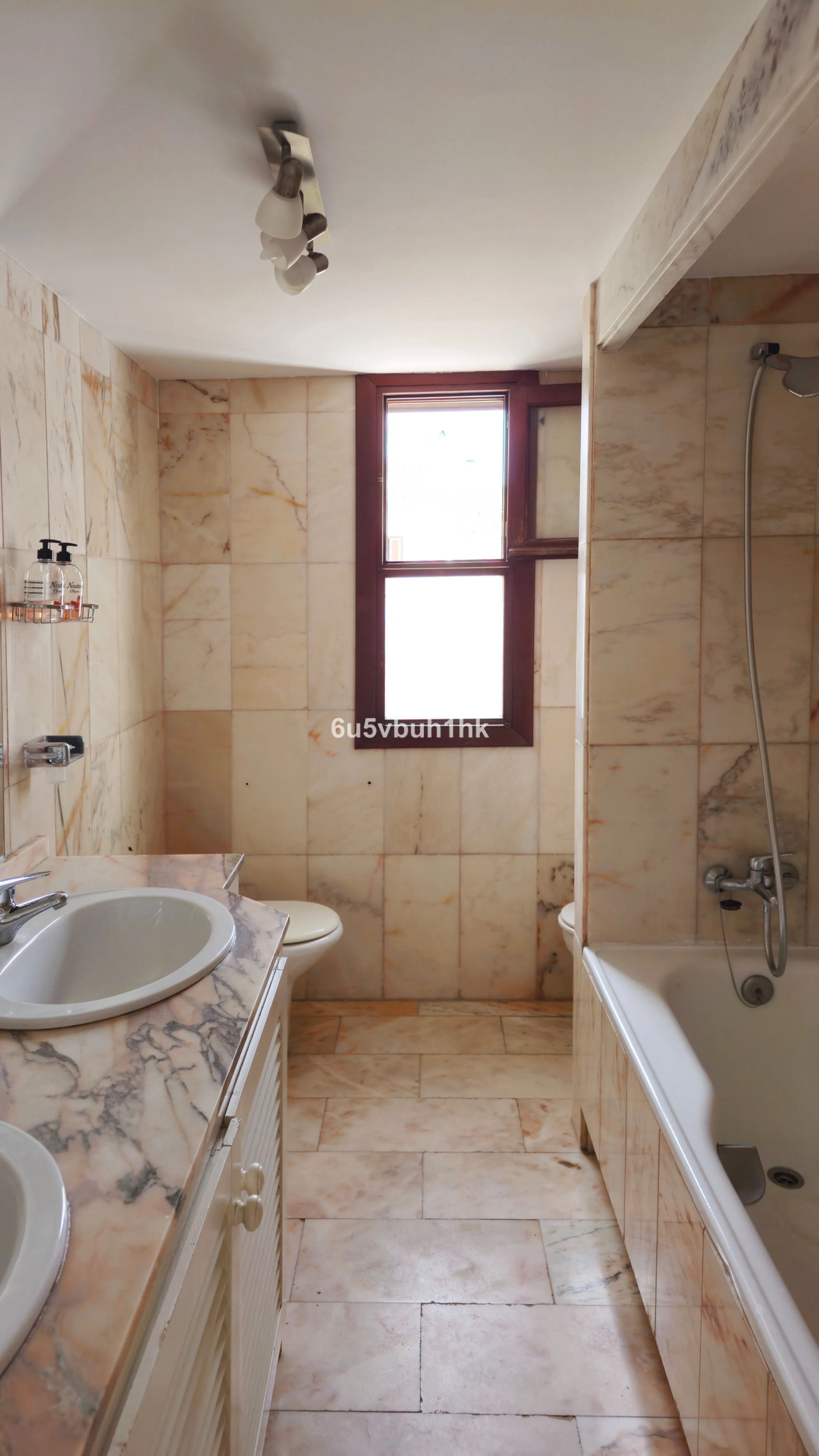 Located in the established Bahia Azul urbanisation, this traditional Spanish house offers an excellent opportunity to acquire a property with direct access to the beach and communal amenities.