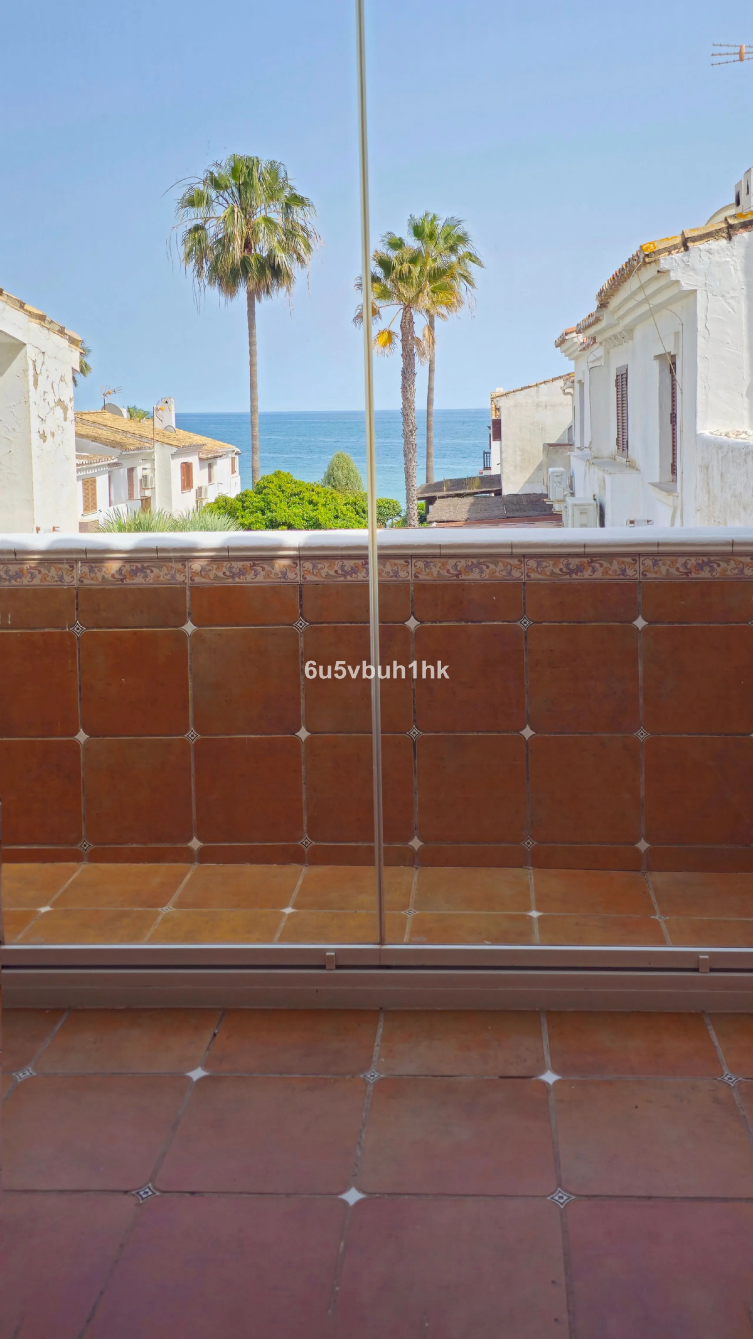 Located in the established Bahia Azul urbanisation, this traditional Spanish house offers an excellent opportunity to acquire a property with direct access to the beach and communal amenities.