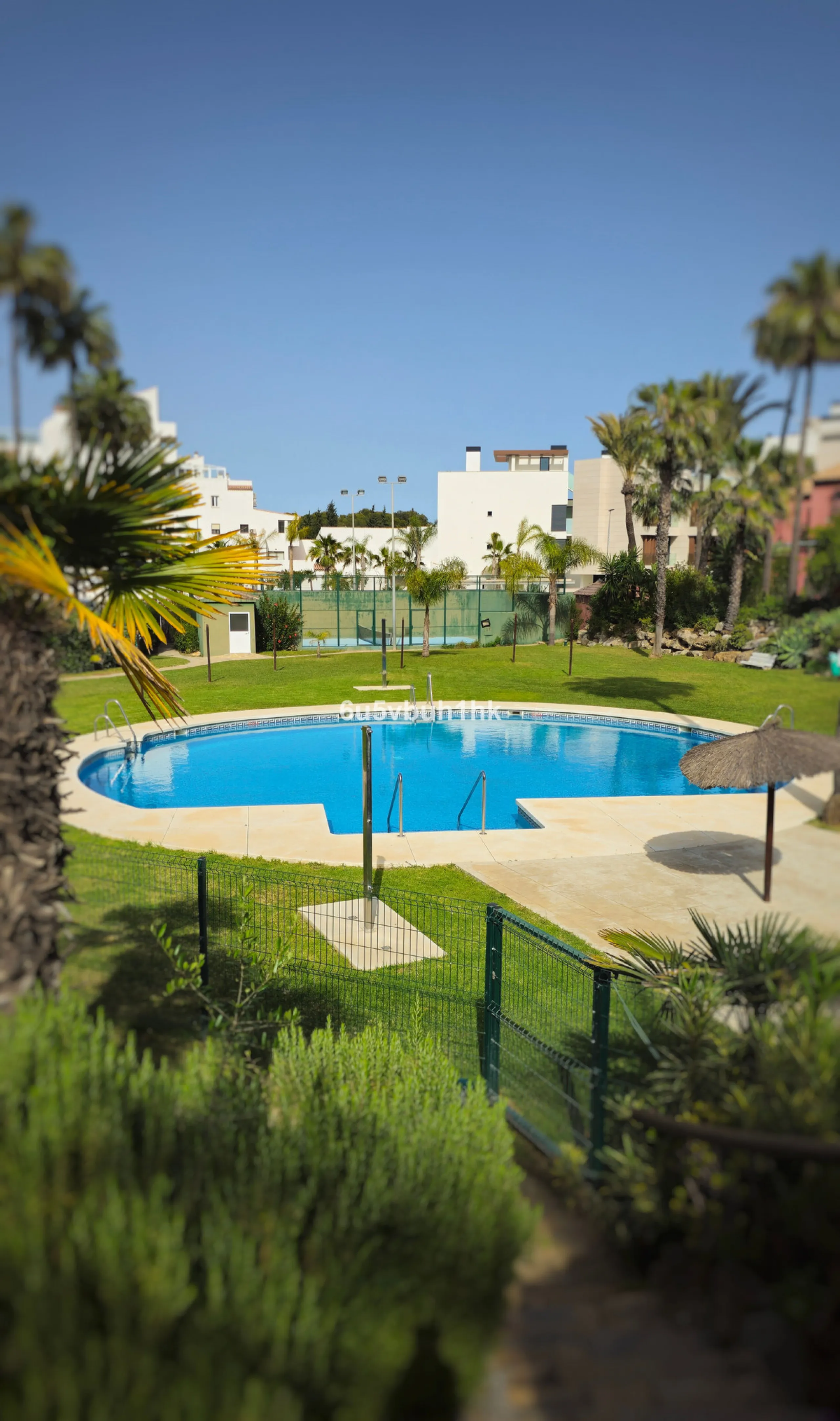 Located in the established Bahia Azul urbanisation, this traditional Spanish house offers an excellent opportunity to acquire a property with direct access to the beach and communal amenities.