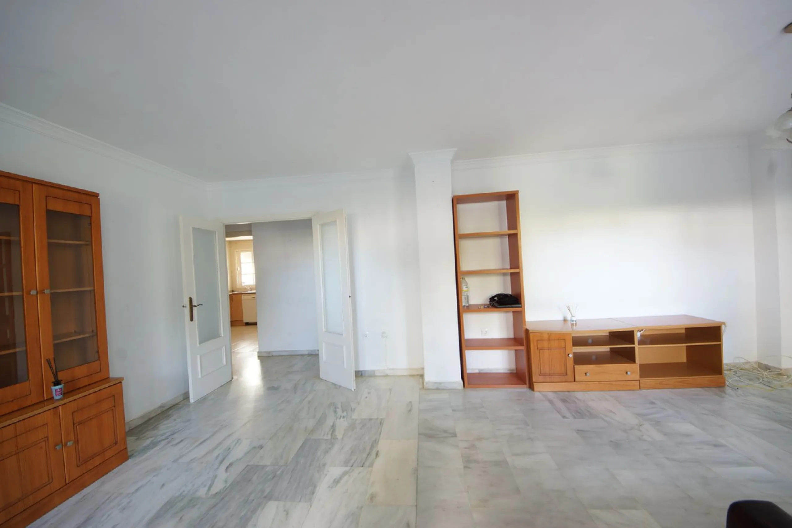 Spacious ground-floor apartment in a residential complex with a pool.