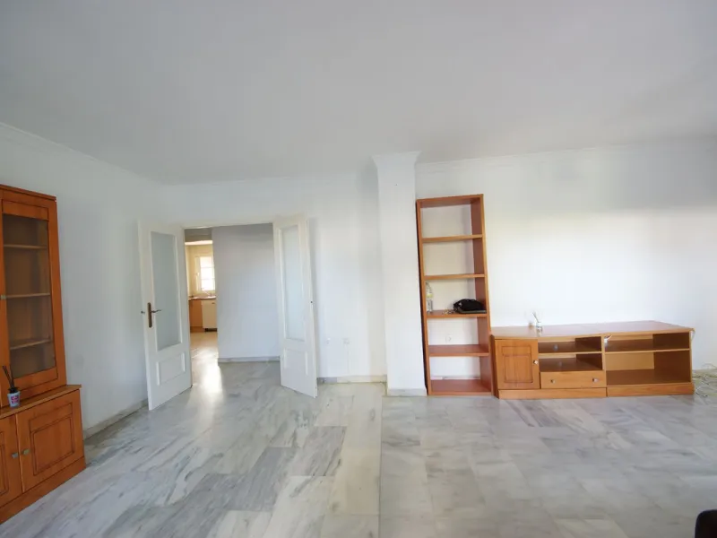 Spacious ground-floor apartment in a residential complex with a pool.