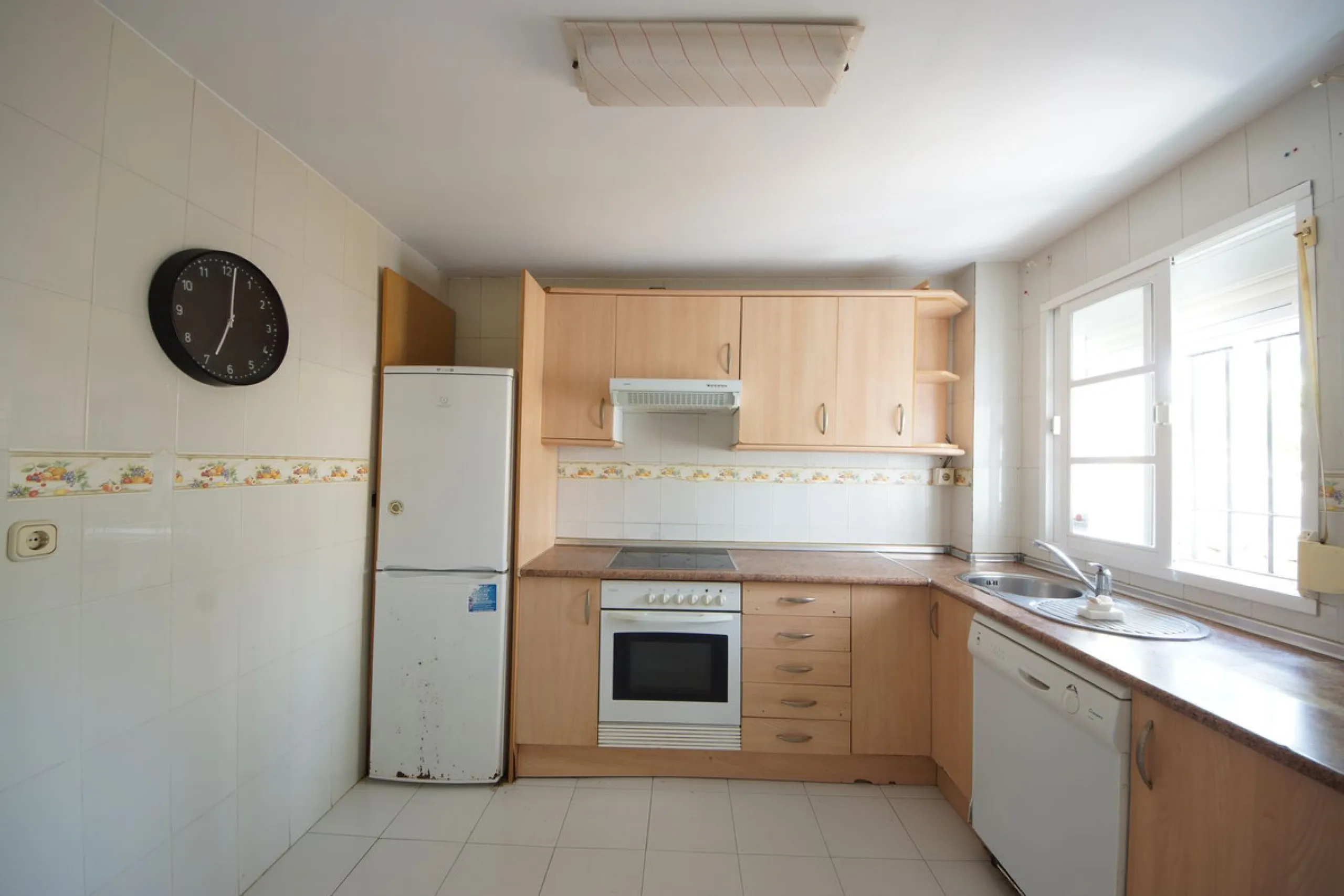 Spacious ground-floor apartment in a residential complex with a pool.