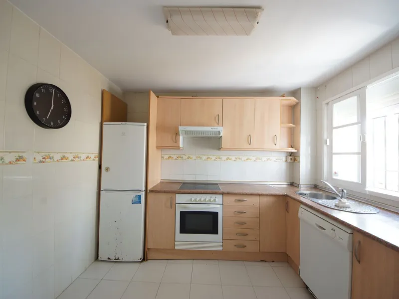 Spacious ground-floor apartment in a residential complex with a pool.