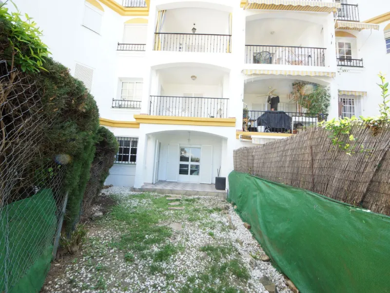 Spacious ground-floor apartment in a residential complex with a pool.