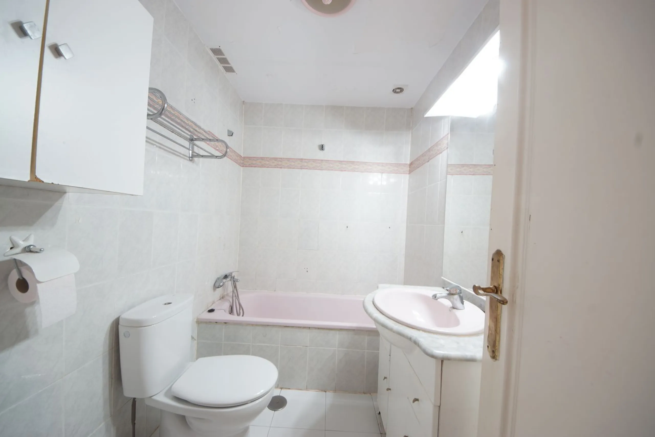 Spacious ground-floor apartment in a residential complex with a pool.