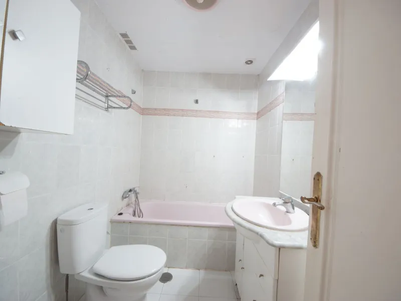 Spacious ground-floor apartment in a residential complex with a pool.
