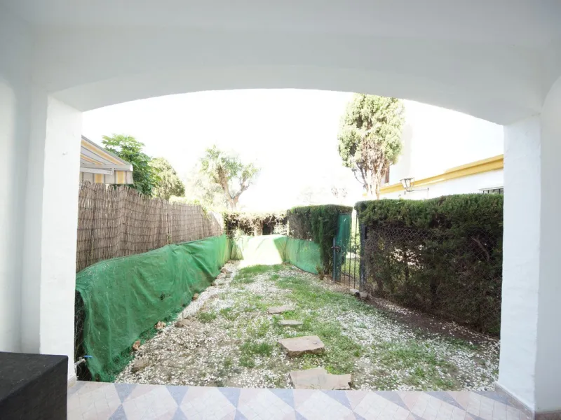 Spacious ground-floor apartment in a residential complex with a pool.