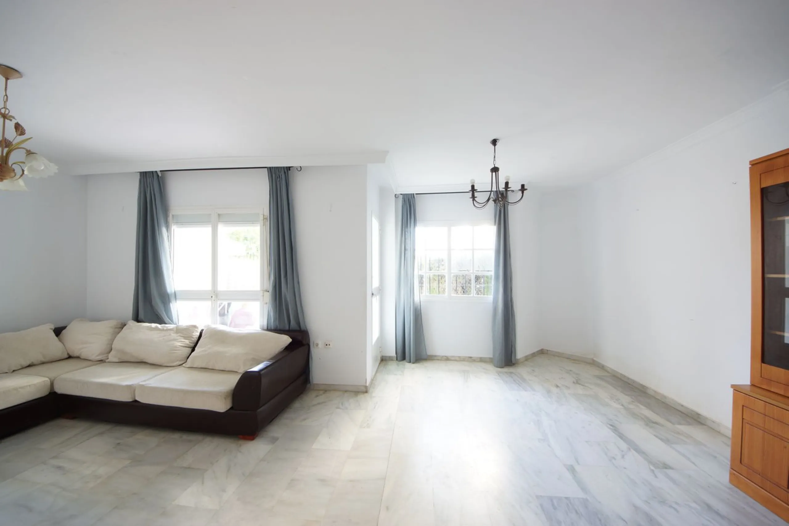 Spacious ground-floor apartment in a residential complex with a pool.