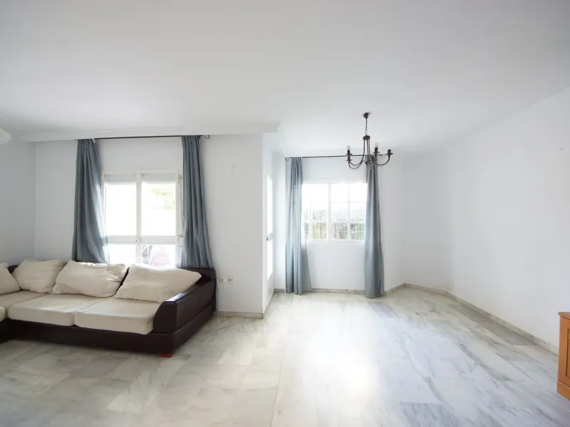 Spacious ground-floor apartment in a residential complex with a pool.