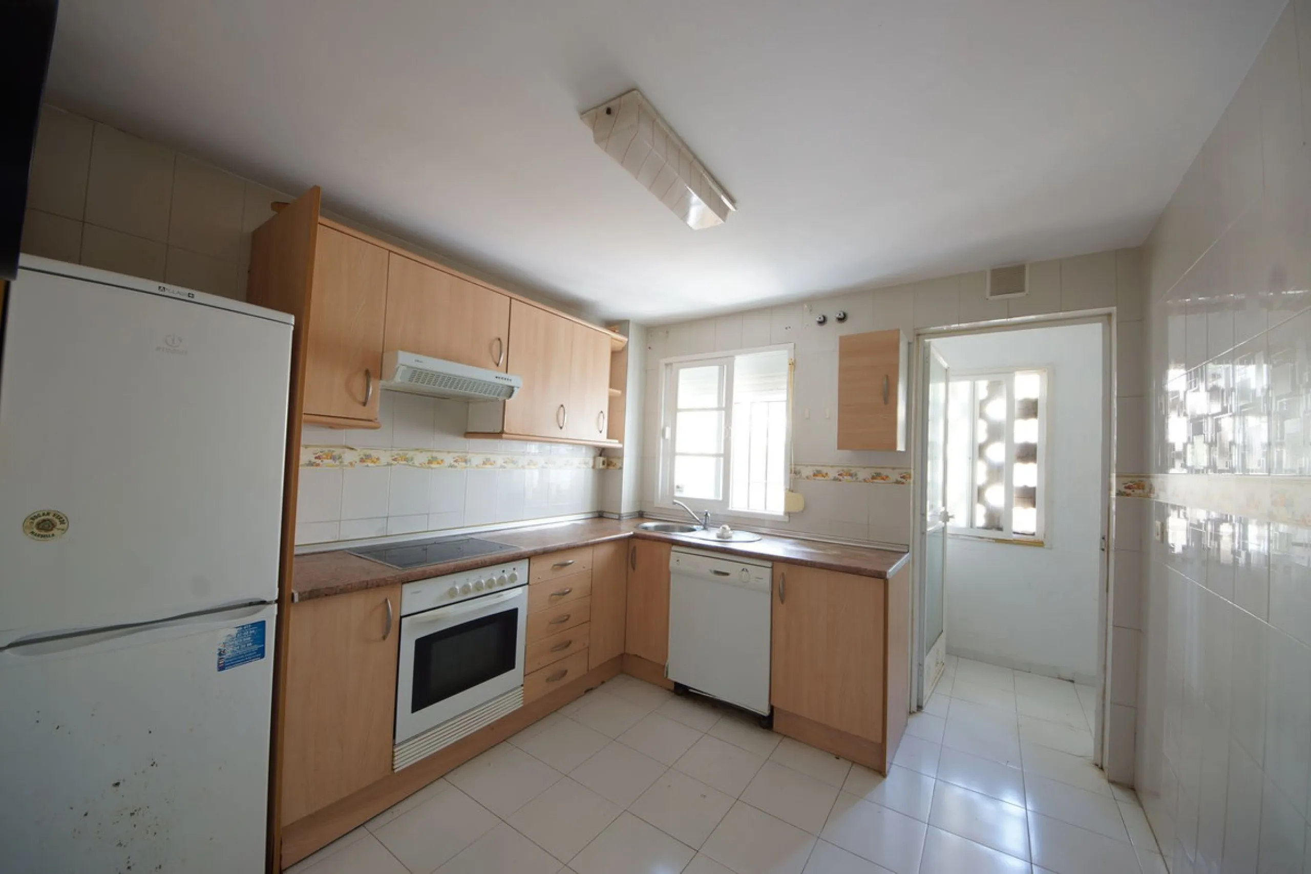 Spacious ground-floor apartment in a residential complex with a pool.