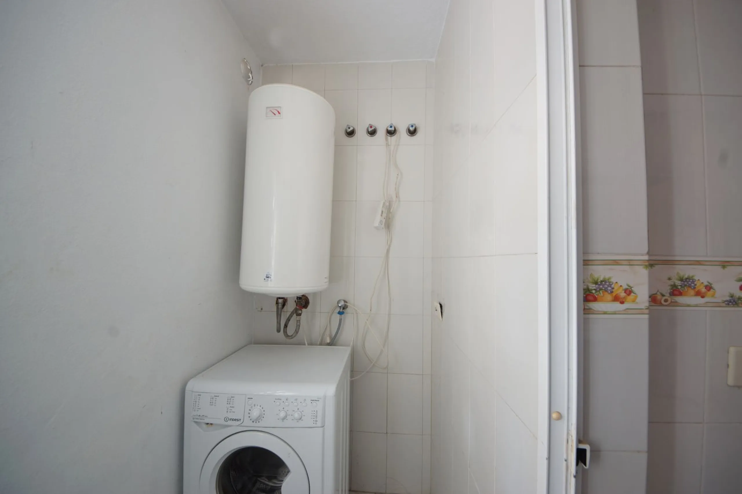Spacious ground-floor apartment in a residential complex with a pool.