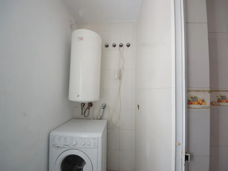 Spacious ground-floor apartment in a residential complex with a pool.