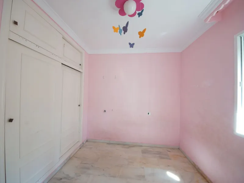 Spacious ground-floor apartment in a residential complex with a pool.