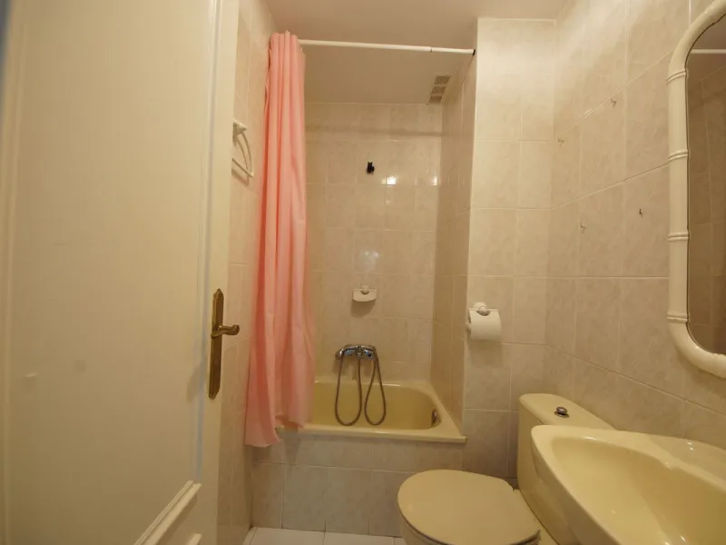 Spacious ground-floor apartment in a residential complex with a pool.