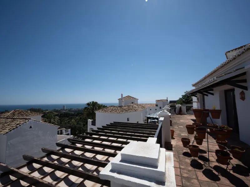 Nestled in the charming Andalusian-style urbanization of Pueblo Los Monteros in Altos de Marbella, this extraordinary apartment blends traditional elegance with modern sophistication. Originally two separate side-by-side duplex properties, this residence 
