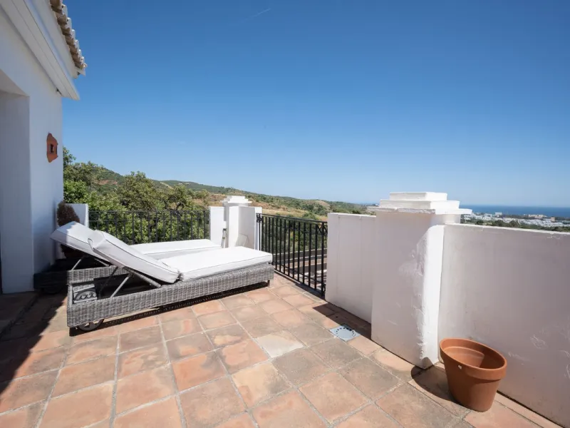 Nestled in the charming Andalusian-style urbanization of Pueblo Los Monteros in Altos de Marbella, this extraordinary apartment blends traditional elegance with modern sophistication. Originally two separate side-by-side duplex properties, this residence 