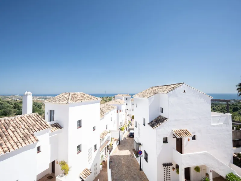 Nestled in the charming Andalusian-style urbanization of Pueblo Los Monteros in Altos de Marbella, this extraordinary apartment blends traditional elegance with modern sophistication. Originally two separate side-by-side duplex properties, this residence 