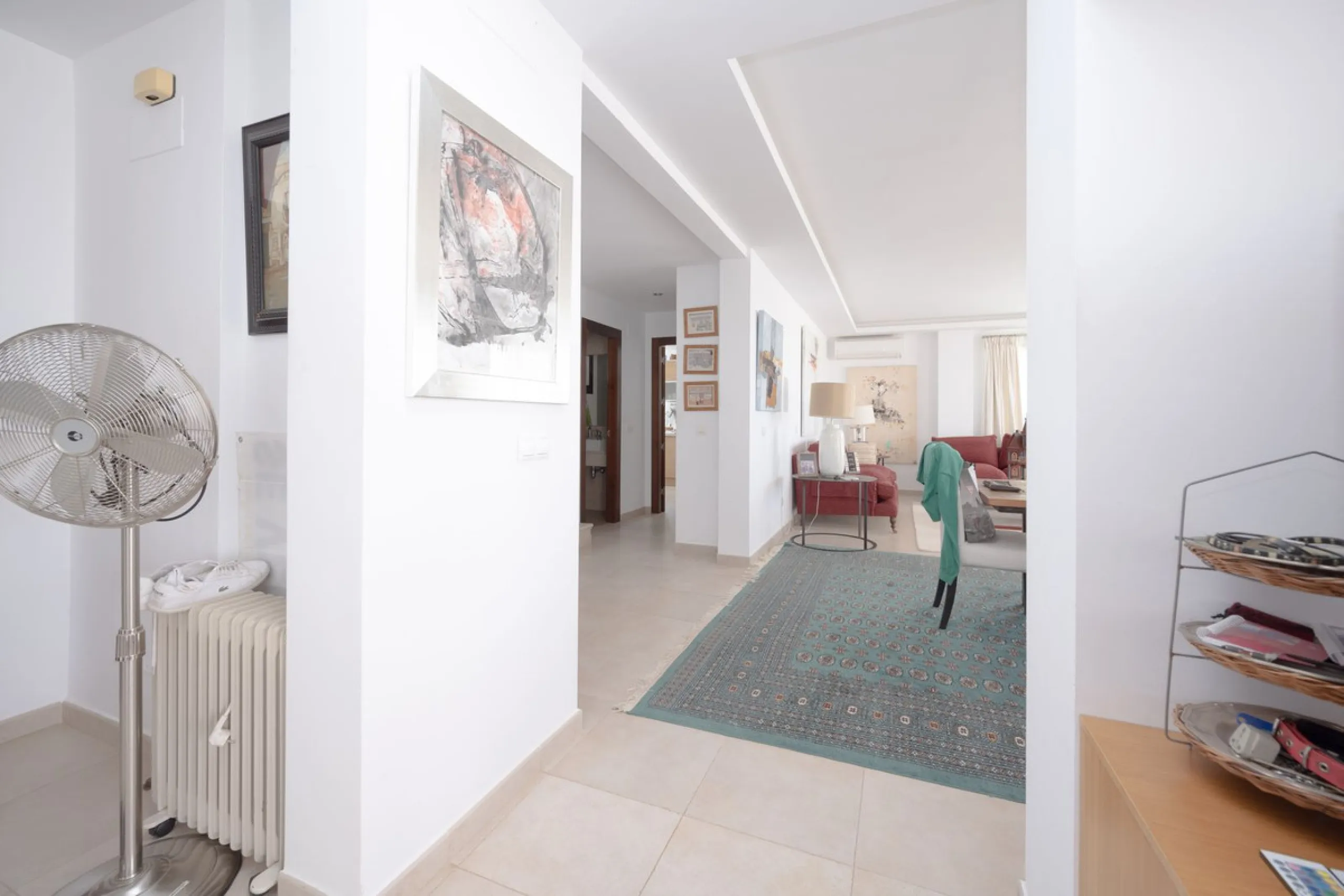 Nestled in the charming Andalusian-style urbanization of Pueblo Los Monteros in Altos de Marbella, this extraordinary apartment blends traditional elegance with modern sophistication. Originally two separate side-by-side duplex properties, this residence 