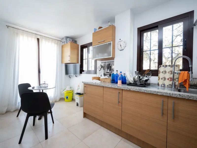 Nestled in the charming Andalusian-style urbanization of Pueblo Los Monteros in Altos de Marbella, this extraordinary apartment blends traditional elegance with modern sophistication. Originally two separate side-by-side duplex properties, this residence 