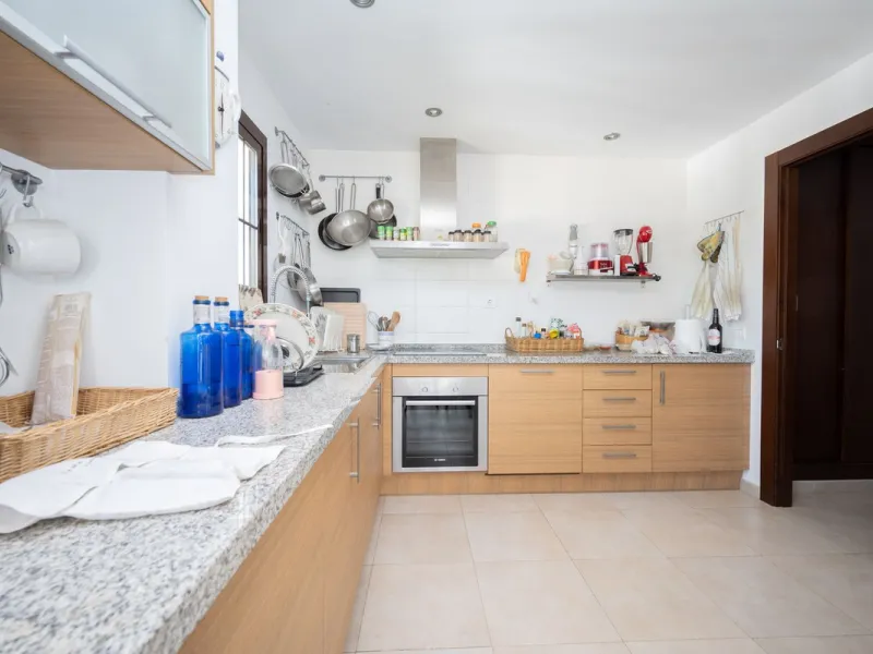 Nestled in the charming Andalusian-style urbanization of Pueblo Los Monteros in Altos de Marbella, this extraordinary apartment blends traditional elegance with modern sophistication. Originally two separate side-by-side duplex properties, this residence 