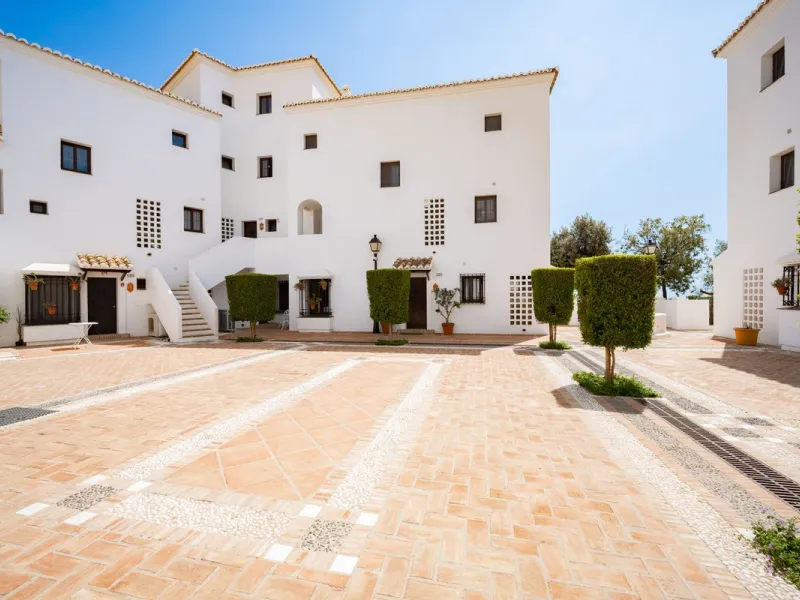 Nestled in the charming Andalusian-style urbanization of Pueblo Los Monteros in Altos de Marbella, this extraordinary apartment blends traditional elegance with modern sophistication. Originally two separate side-by-side duplex properties, this residence 