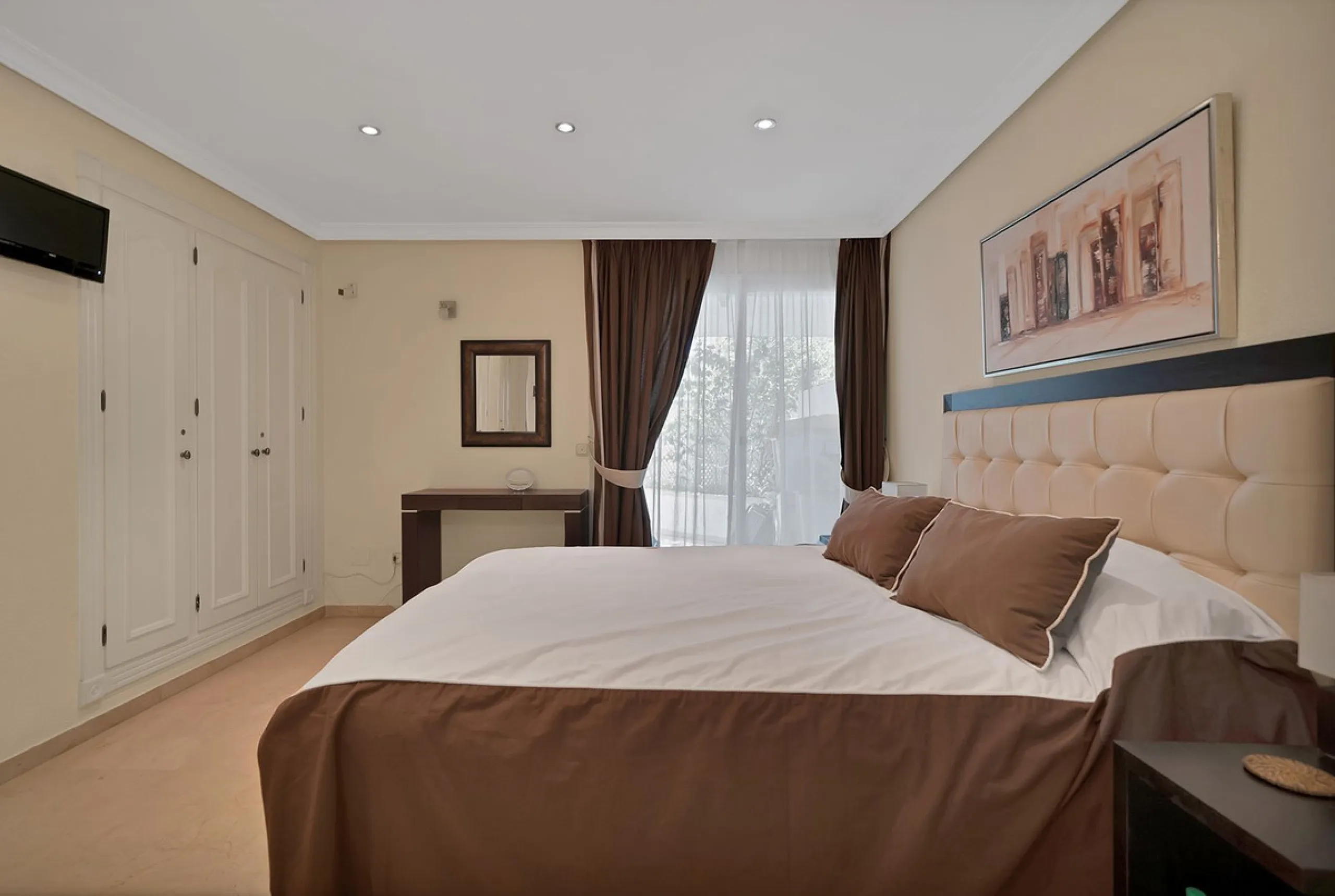Discover seaside serenity in Estepona's ever popular complex - Dominion Beach located on the New Golden Mile. This spacious 2-bedroom, 2-bathroom apartment puts you just steps from the sand, with no road noise to disrupt the tranquility. The apartment is 