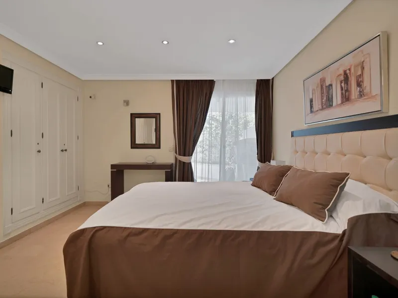 Discover seaside serenity in Estepona's ever popular complex - Dominion Beach located on the New Golden Mile. This spacious 2-bedroom, 2-bathroom apartment puts you just steps from the sand, with no road noise to disrupt the tranquility. The apartment is 