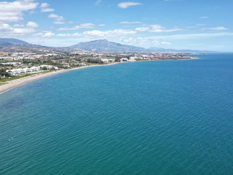Discover seaside serenity in Estepona's ever popular complex - Dominion Beach located on the New Golden Mile. This spacious 2-bedroom, 2-bathroom apartment puts you just steps from the sand, with no road noise to disrupt the tranquility. The apartment is 