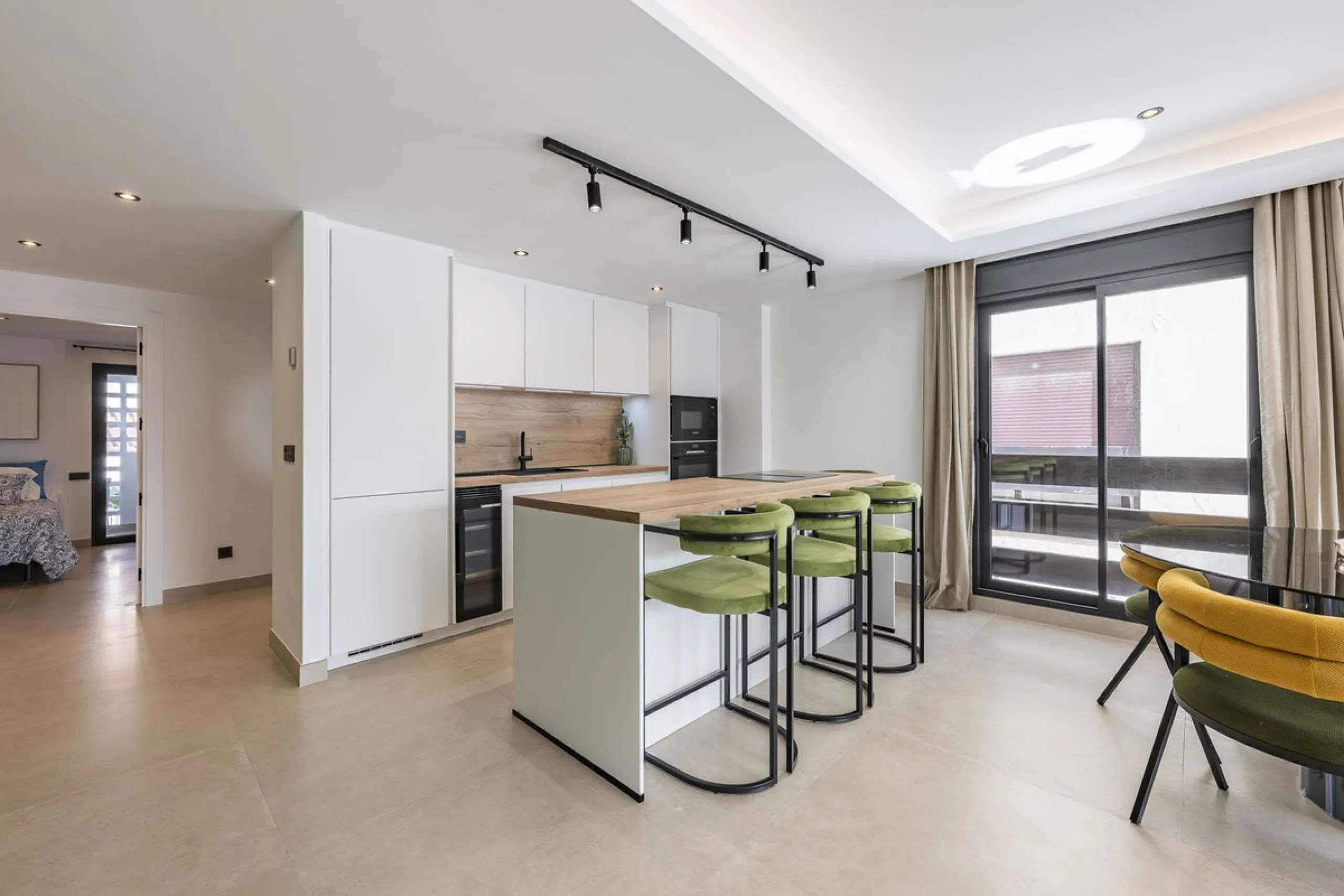 Luxury renovation in Nueva Andalucia. Top quality refurbishment with underfloor heating in the bathrooms and modern fire place.  In la Maestranza, a closed development with 24 hours security, very well maintained gardens and green areas with 2 pools (one 