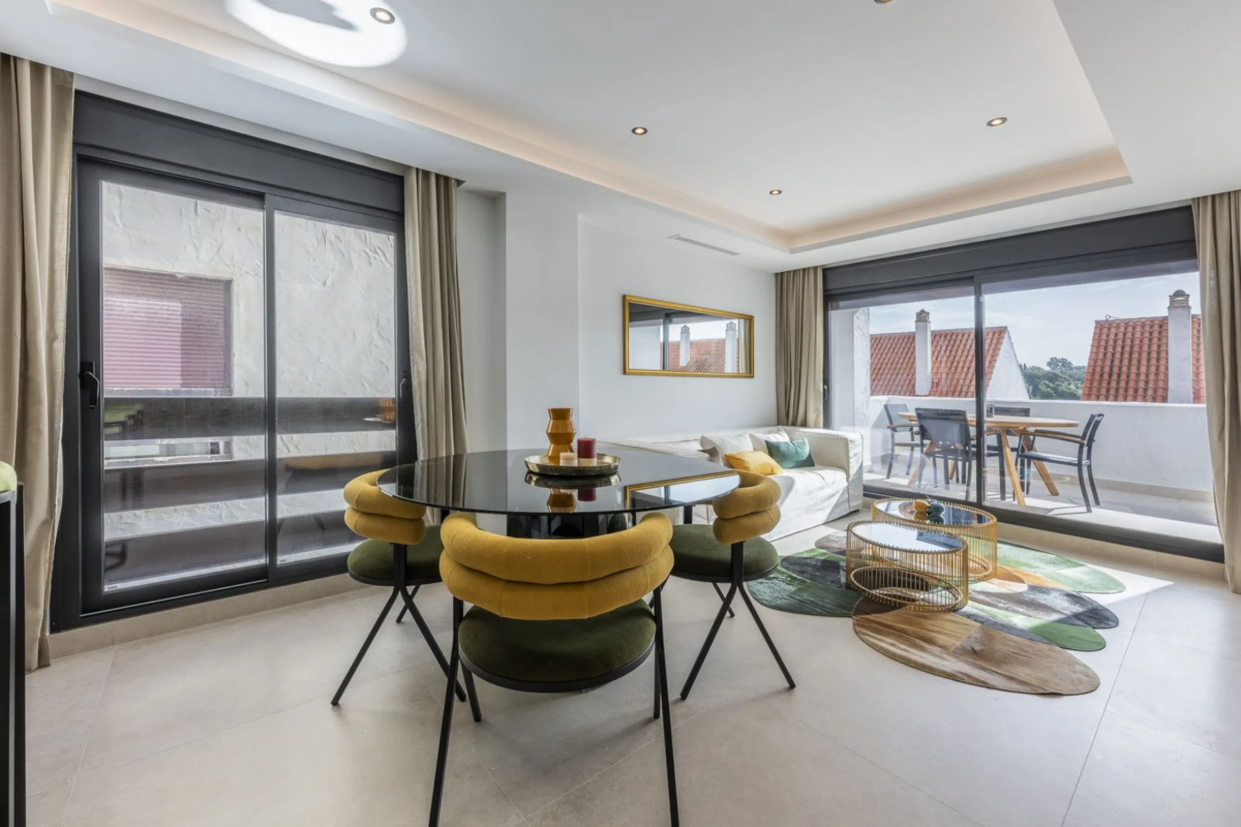 Luxury renovation in Nueva Andalucia. Top quality refurbishment with underfloor heating in the bathrooms and modern fire place.  In la Maestranza, a closed development with 24 hours security, very well maintained gardens and green areas with 2 pools (one 