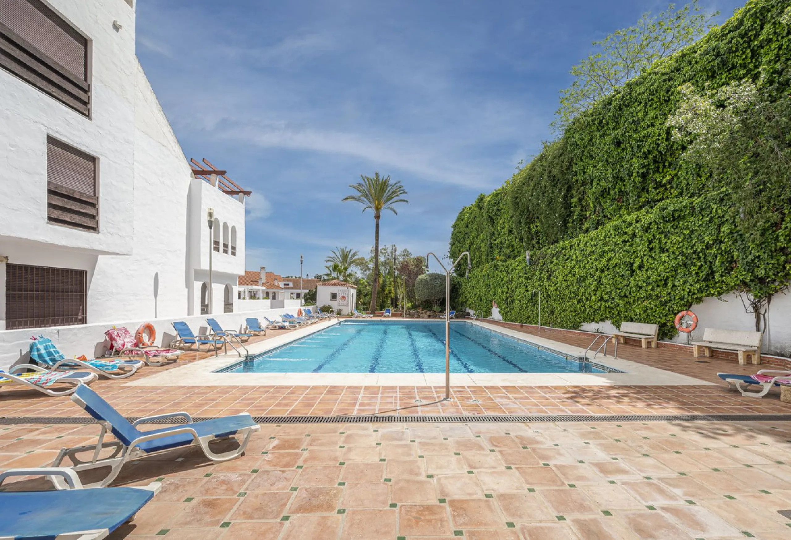 Luxury renovation in Nueva Andalucia. Top quality refurbishment with underfloor heating in the bathrooms and modern fire place.  In la Maestranza, a closed development with 24 hours security, very well maintained gardens and green areas with 2 pools (one 