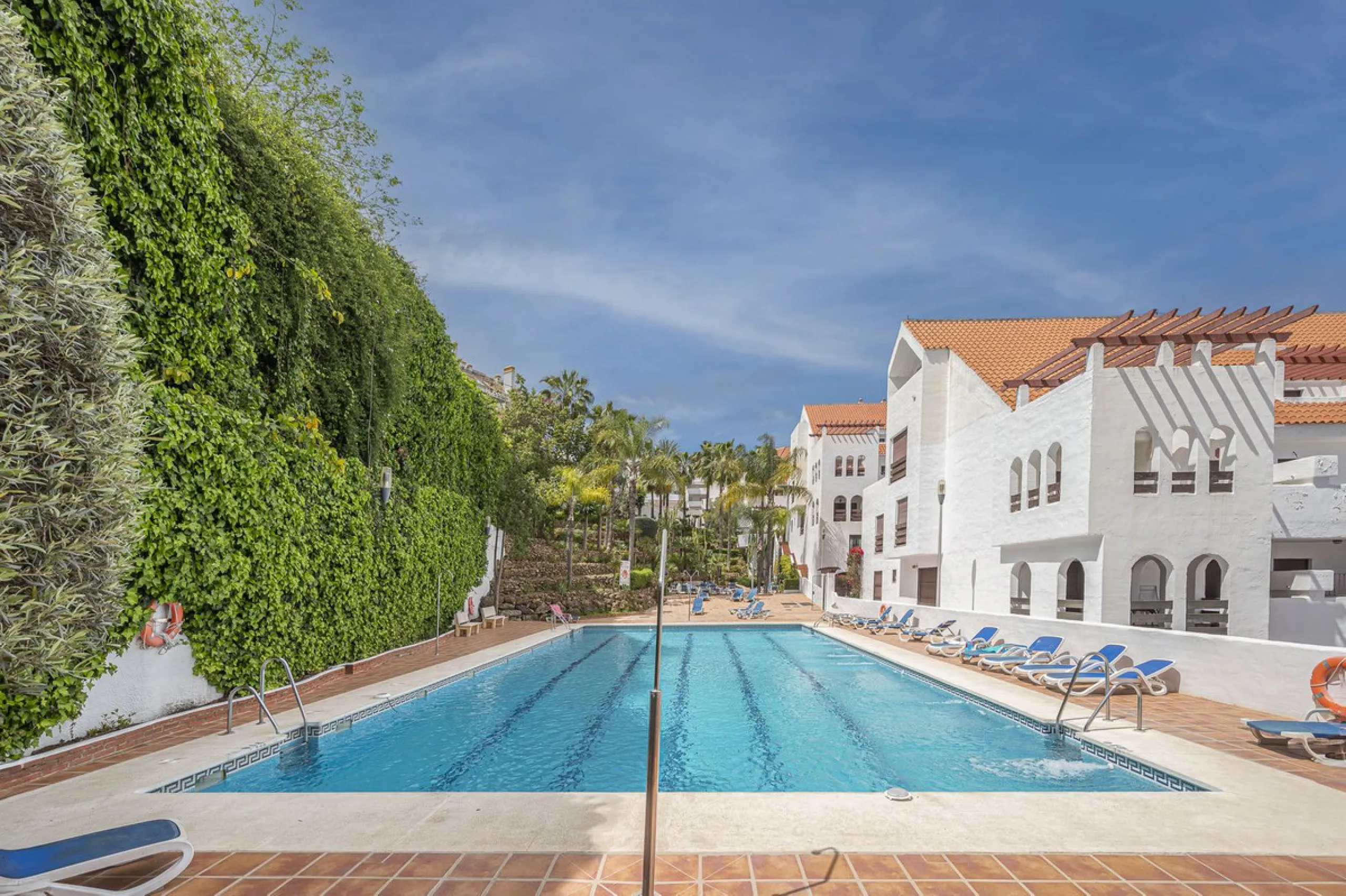 Luxury renovation in Nueva Andalucia. Top quality refurbishment with underfloor heating in the bathrooms and modern fire place.  In la Maestranza, a closed development with 24 hours security, very well maintained gardens and green areas with 2 pools (one 