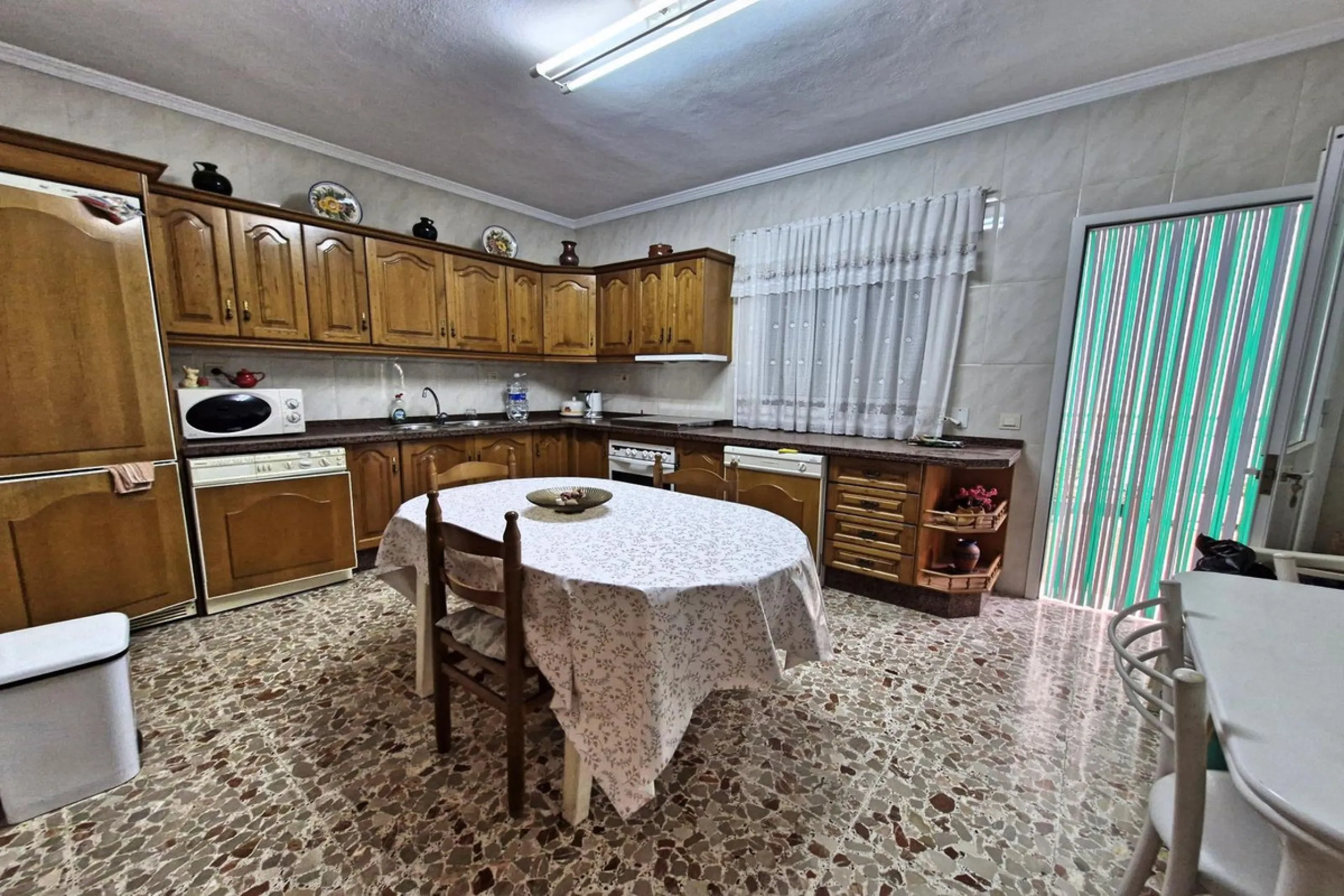 Spacious 7-Bedroom Townhouse with Garage, Garden, Wine Cellar & Panoramic Roof Terrace in Guaro Village.