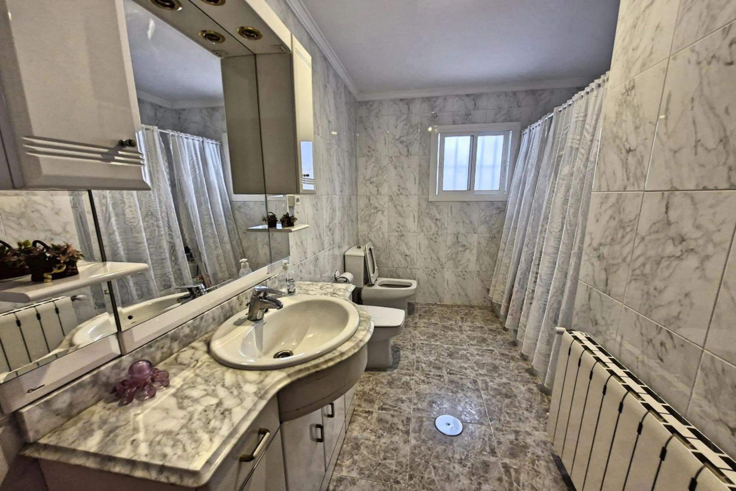Spacious 7-Bedroom Townhouse with Garage, Garden, Wine Cellar & Panoramic Roof Terrace in Guaro Village.