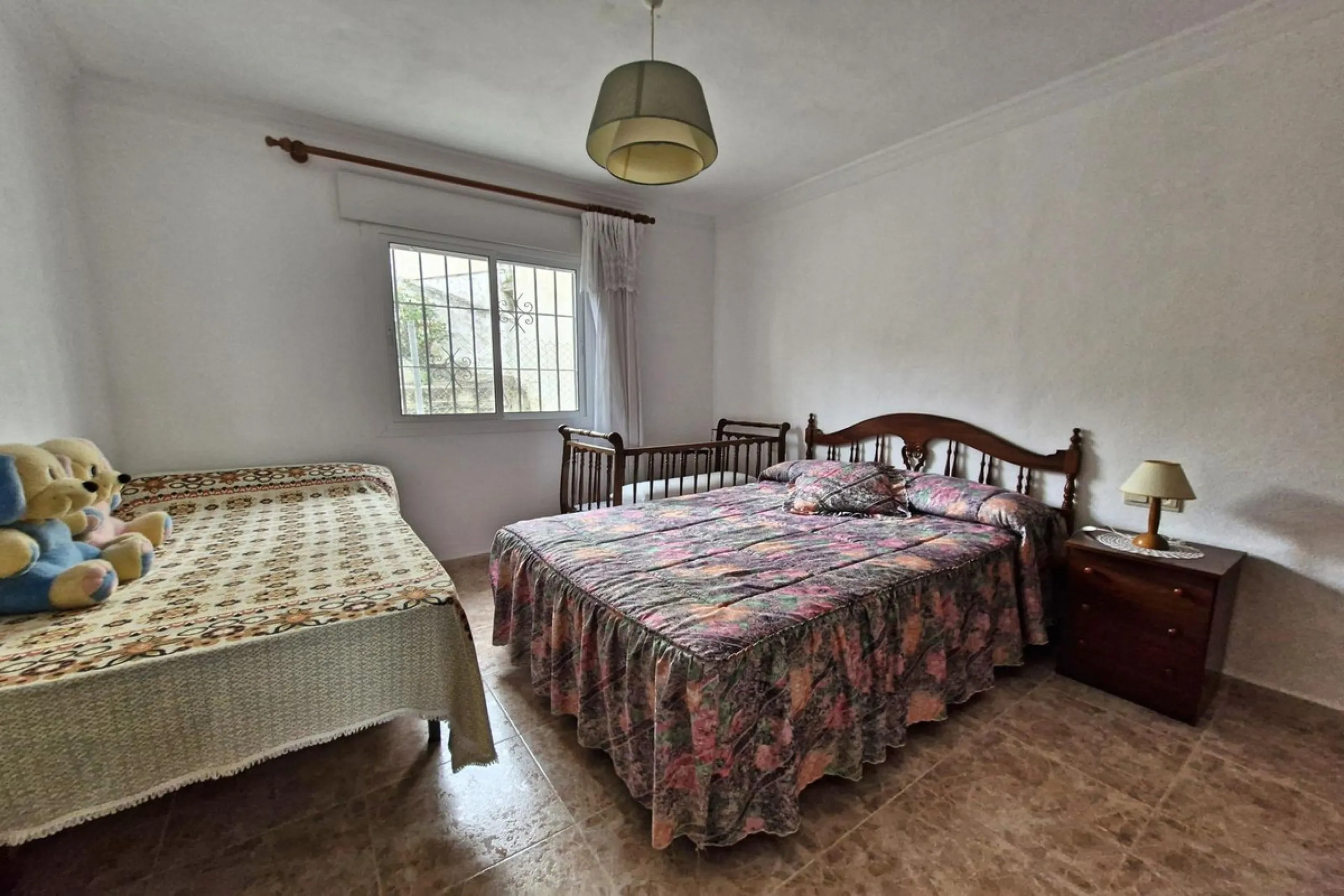 Spacious 7-Bedroom Townhouse with Garage, Garden, Wine Cellar & Panoramic Roof Terrace in Guaro Village.