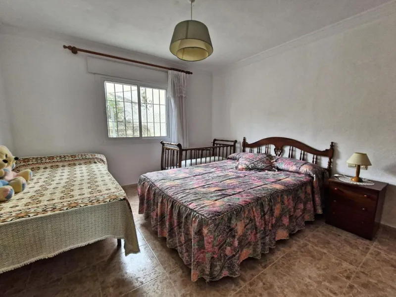 Spacious 7-Bedroom Townhouse with Garage, Garden, Wine Cellar & Panoramic Roof Terrace in Guaro Village.