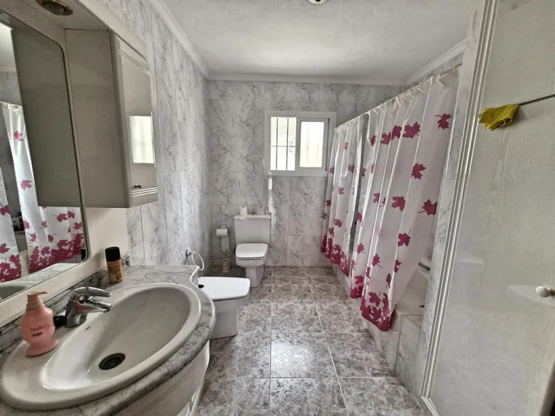 Spacious 7-Bedroom Townhouse with Garage, Garden, Wine Cellar & Panoramic Roof Terrace in Guaro Village.