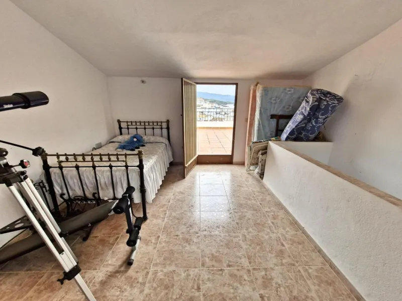 Spacious 7-Bedroom Townhouse with Garage, Garden, Wine Cellar & Panoramic Roof Terrace in Guaro Village.
