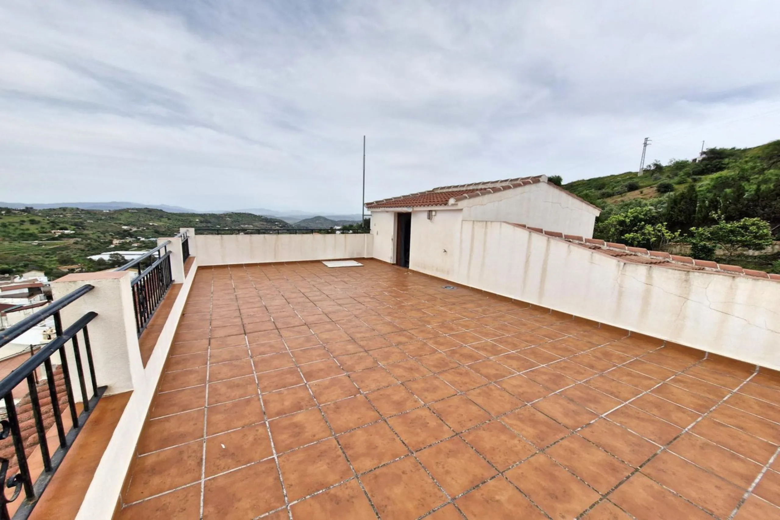Spacious 7-Bedroom Townhouse with Garage, Garden, Wine Cellar & Panoramic Roof Terrace in Guaro Village.