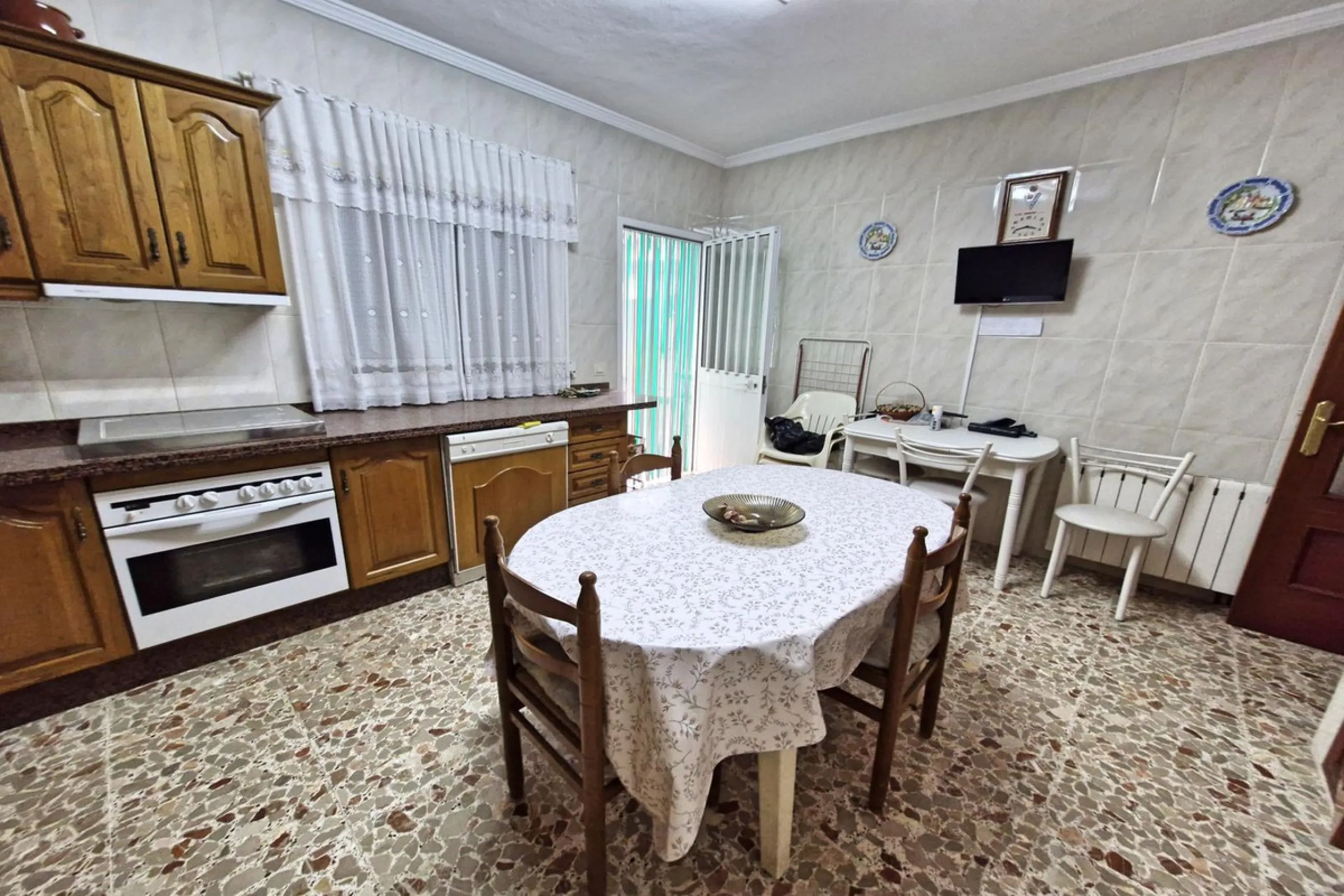 Spacious 7-Bedroom Townhouse with Garage, Garden, Wine Cellar & Panoramic Roof Terrace in Guaro Village.
