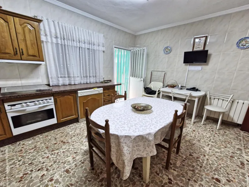 Spacious 7-Bedroom Townhouse with Garage, Garden, Wine Cellar & Panoramic Roof Terrace in Guaro Village.
