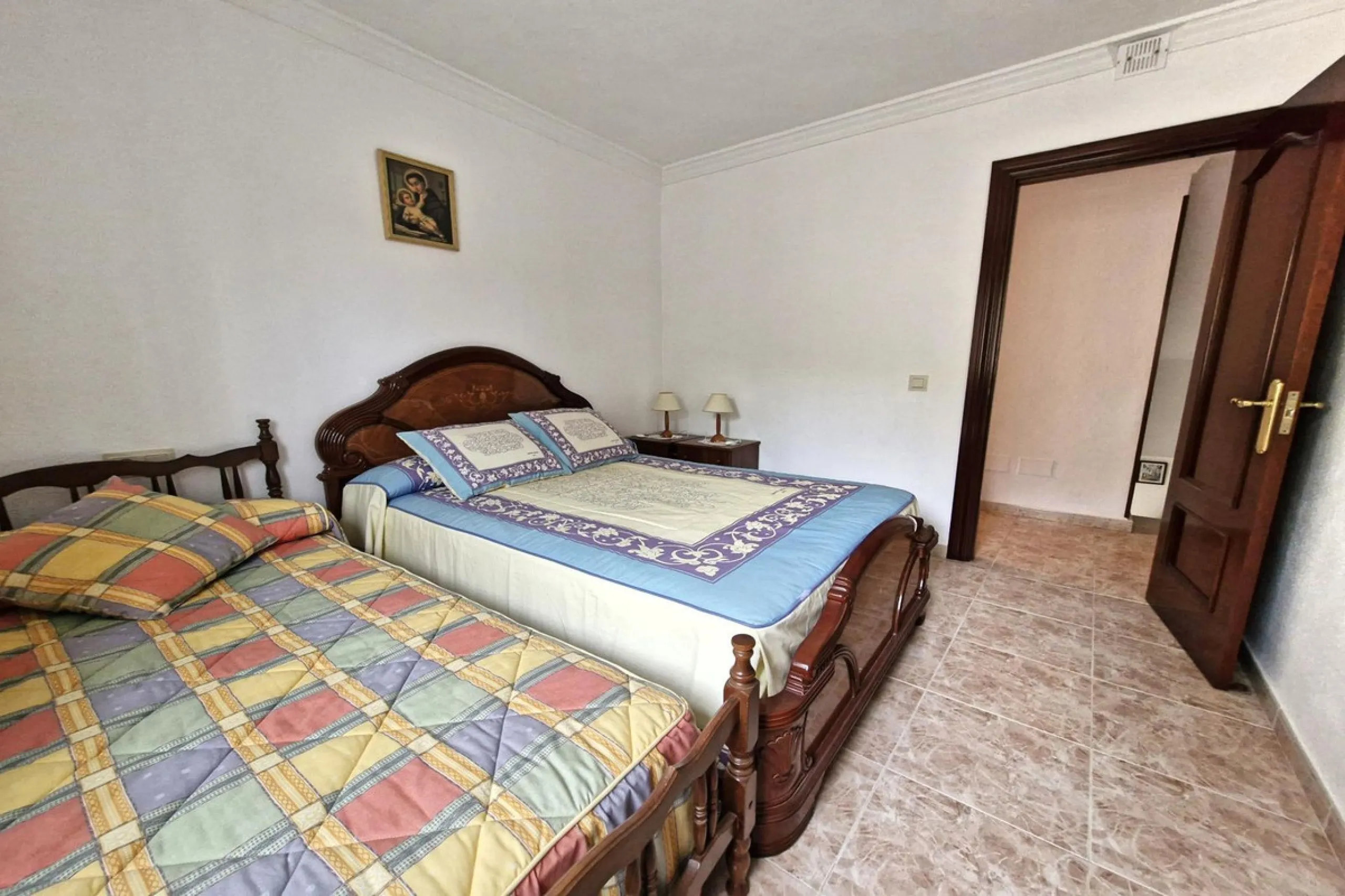 Spacious 7-Bedroom Townhouse with Garage, Garden, Wine Cellar & Panoramic Roof Terrace in Guaro Village.
