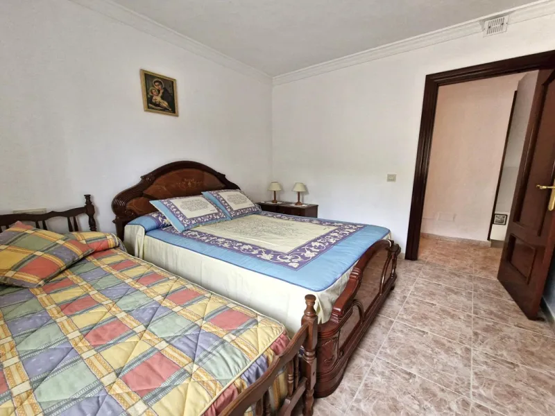 Spacious 7-Bedroom Townhouse with Garage, Garden, Wine Cellar & Panoramic Roof Terrace in Guaro Village.