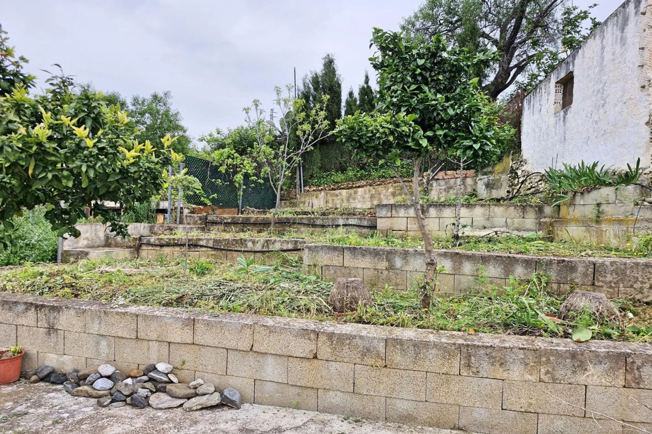 Spacious 7-Bedroom Townhouse with Garage, Garden, Wine Cellar & Panoramic Roof Terrace in Guaro Village.