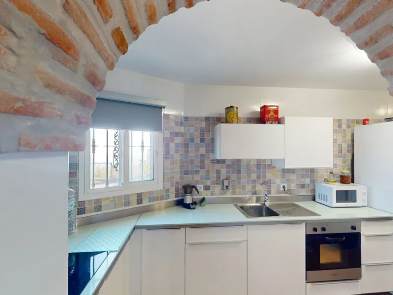 Dream House near Arenas with Sea View and Endless Possibilities! Welcome to your new home nestled in the picturesque surroundings of Arenas. This unique property is divided into three residential units, offering you a lifestyle of extraordinary comfort. U