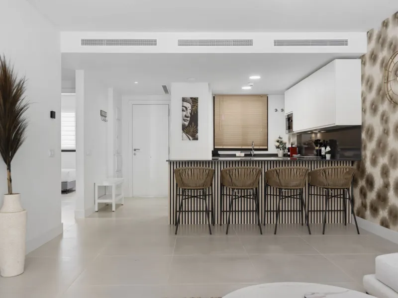 Nestled in the prestigious area of El Higueron, Fuengirola, this luxury apartment offers an exceptional living experience. Designed with comfort and style in mind, the property is situated in a gated community, ensuring privacy and security for its reside