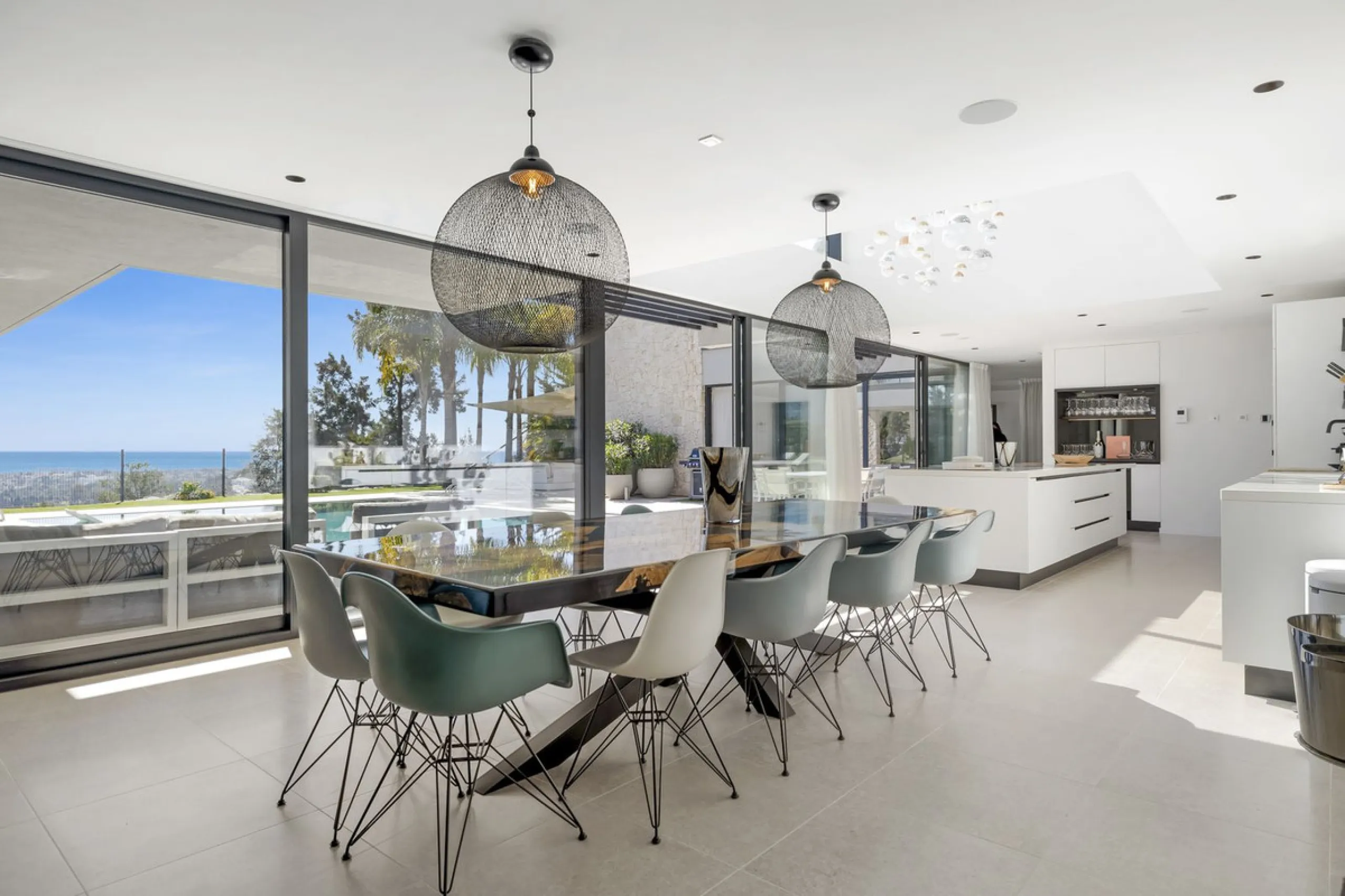 Newly built contemporary villa situated in the prestigious urbanization of La Alquería, Benahavís. Positioned frontline golf and facing east to south, the property offers panoramic views of the Mediterranean Sea, the coastline, and the iconic La Concha mo