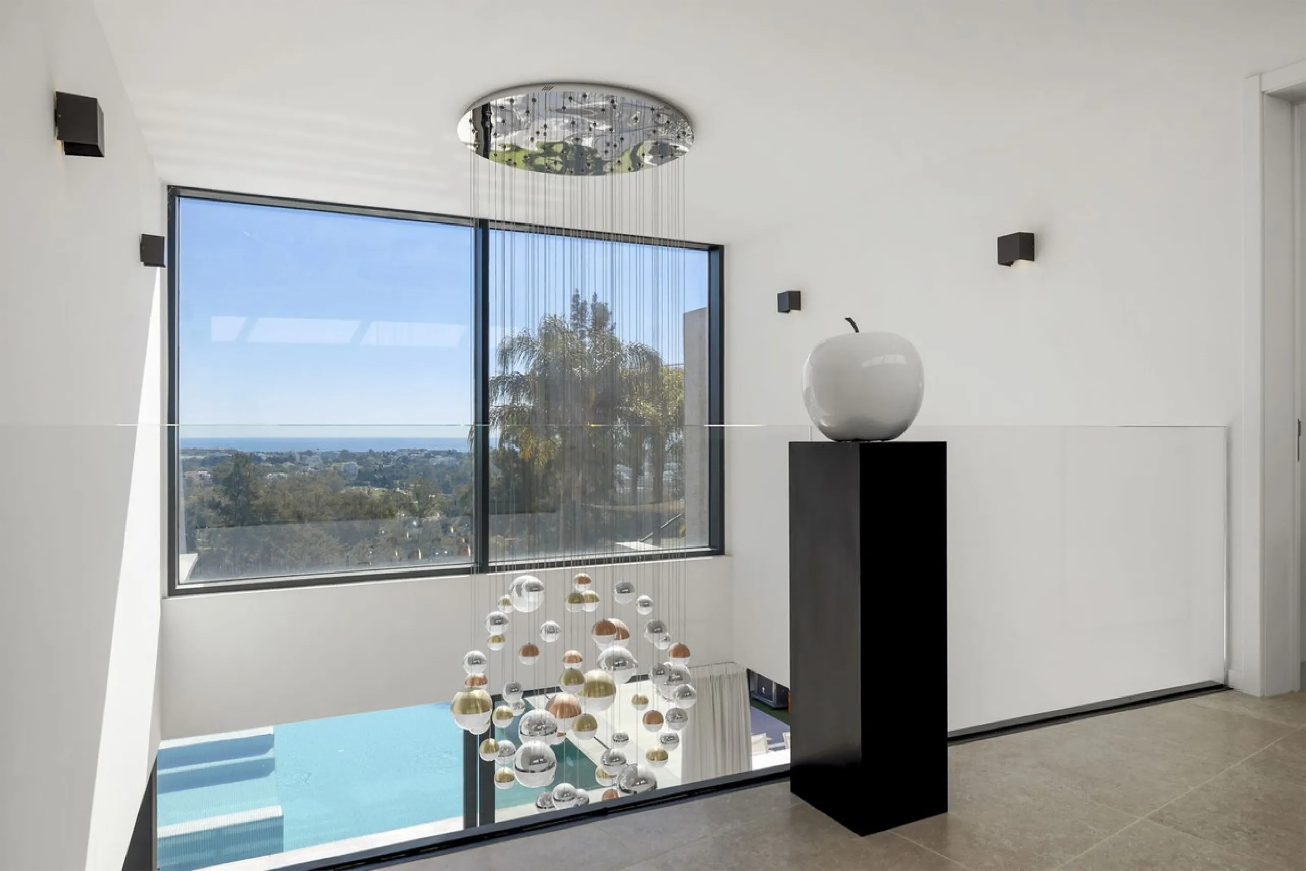 Newly built contemporary villa situated in the prestigious urbanization of La Alquería, Benahavís. Positioned frontline golf and facing east to south, the property offers panoramic views of the Mediterranean Sea, the coastline, and the iconic La Concha mo