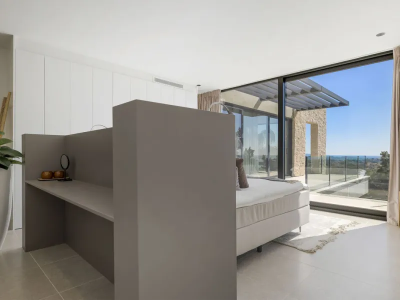 Newly built contemporary villa situated in the prestigious urbanization of La Alquería, Benahavís. Positioned frontline golf and facing east to south, the property offers panoramic views of the Mediterranean Sea, the coastline, and the iconic La Concha mo